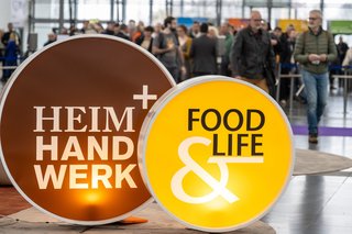 Auf dem Foto sieht man das Logo der "Heim und Handwerk" und das Logo der "Food and Life".