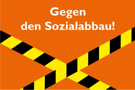 Orangenes Plakat mit Aufschrift gemeinsam gegen den Sozialabbau