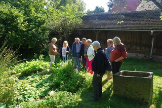 Führung im ehemaligen Bauernhof mit Gemüsegarten