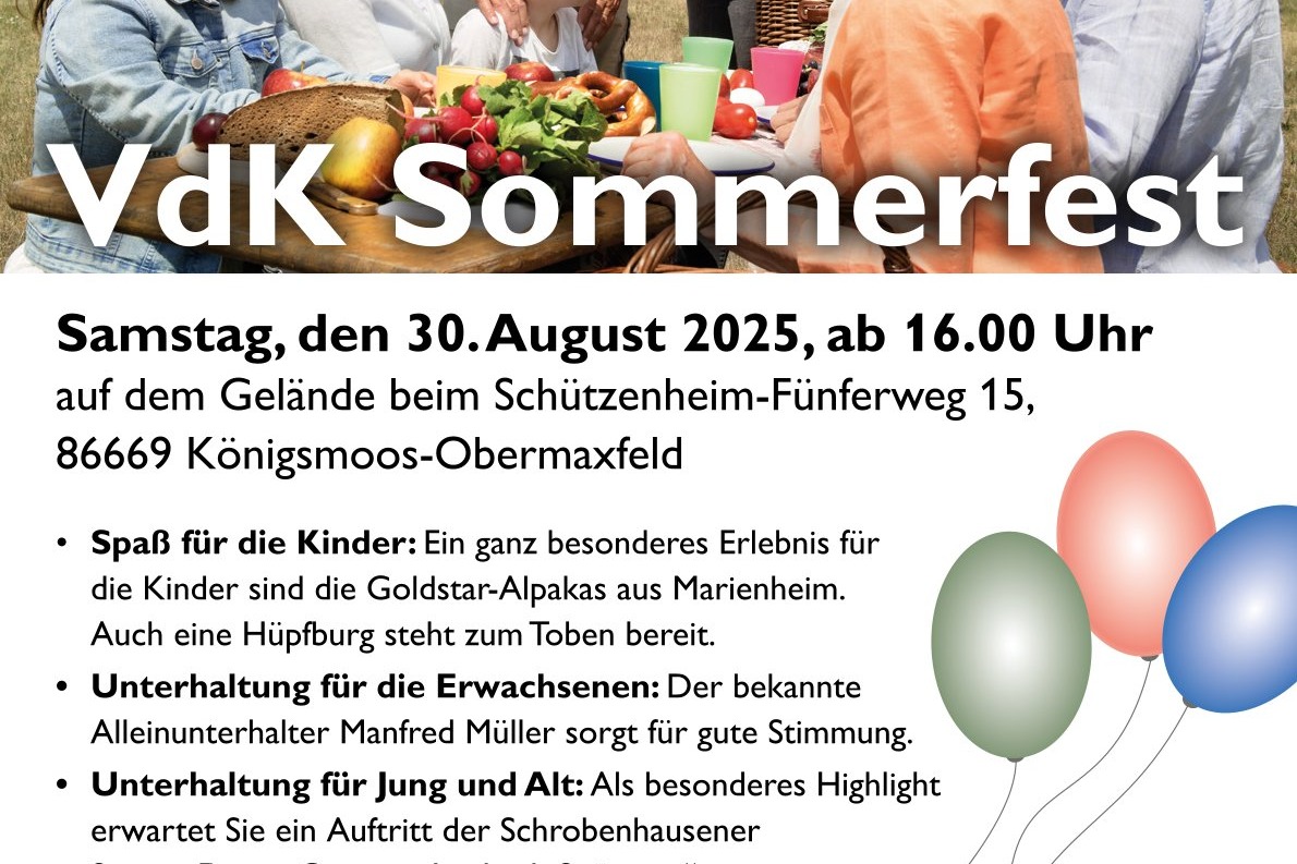 7-köpfige Familie bei der Brotzeit im Freien