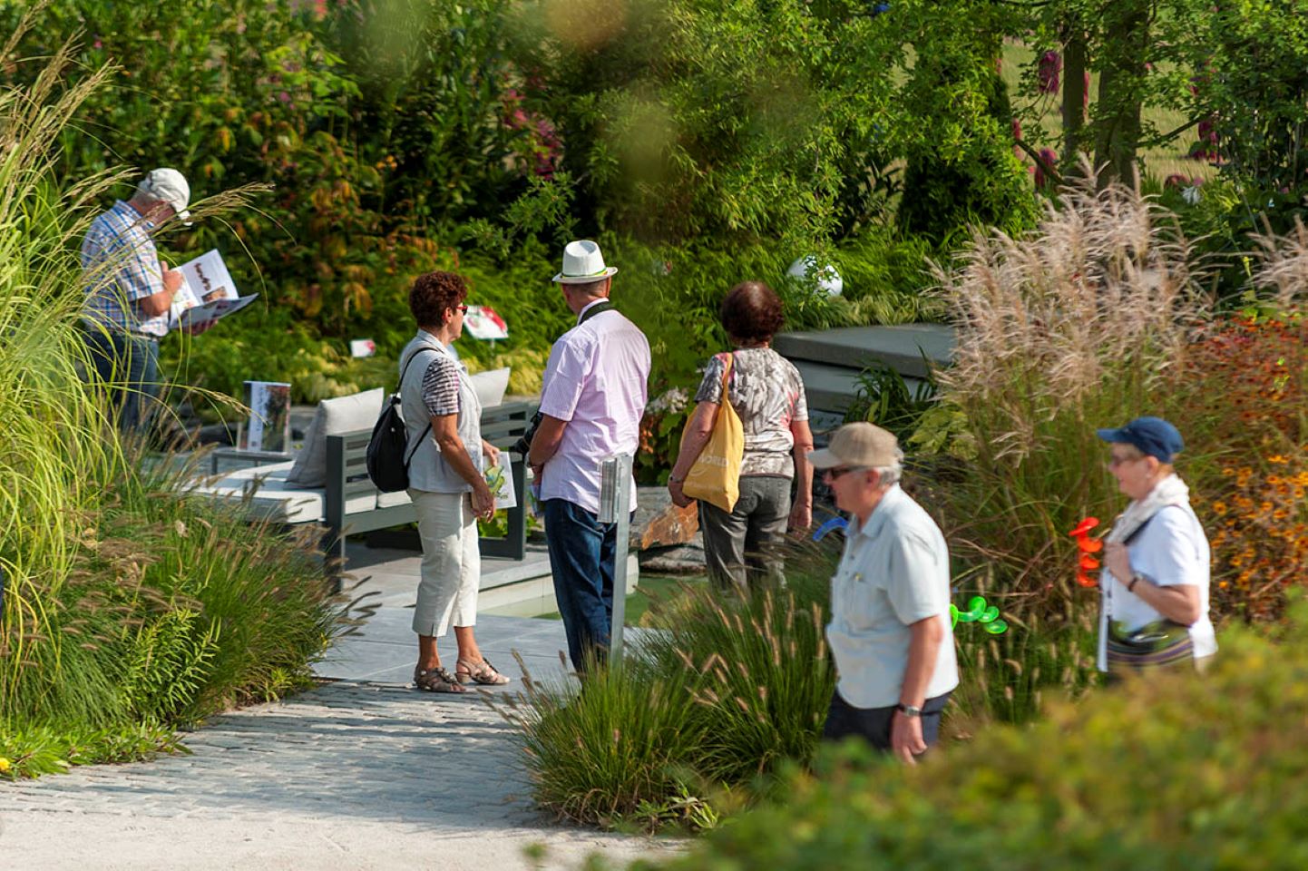 Das Bild, das uns die Landesgartenschau zur Verfügung stellt, zeigt eine kleine Gruppe von Besuchern der Landesgartenschaue